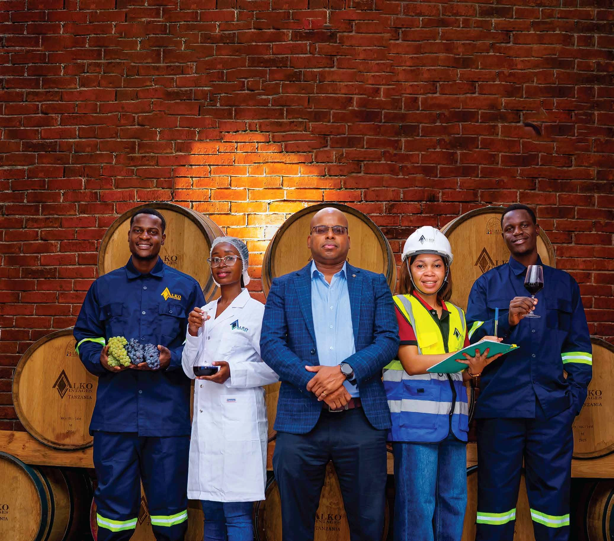 Members of the Alko production, quality and warehouse team in the barrel cellar
